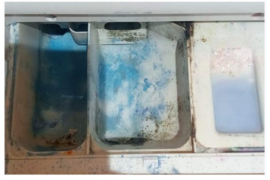 Washer detergent drawer before deep cleaning